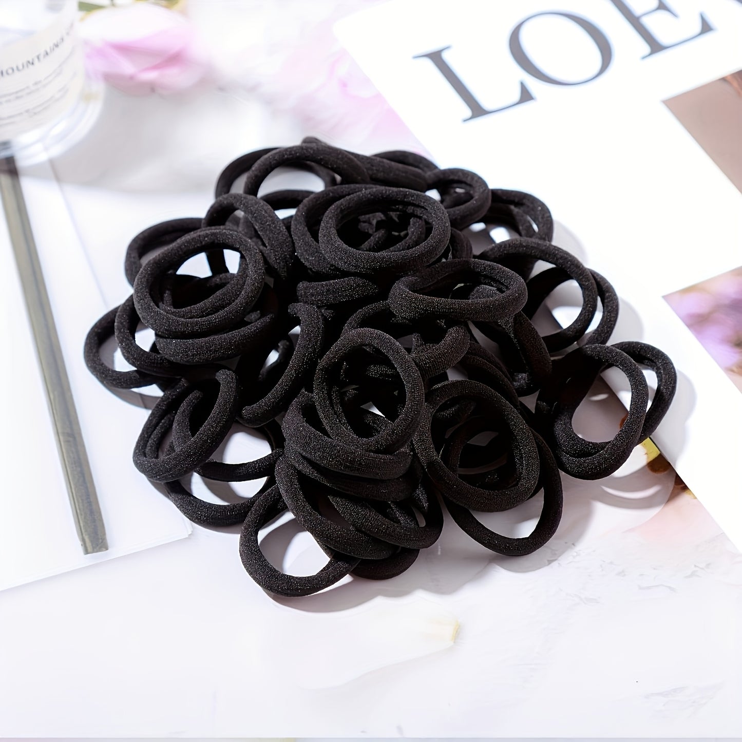 50-Pack High Elasticity Black Hair Ties - Simple Design for Everyday Styling and Versatile Use