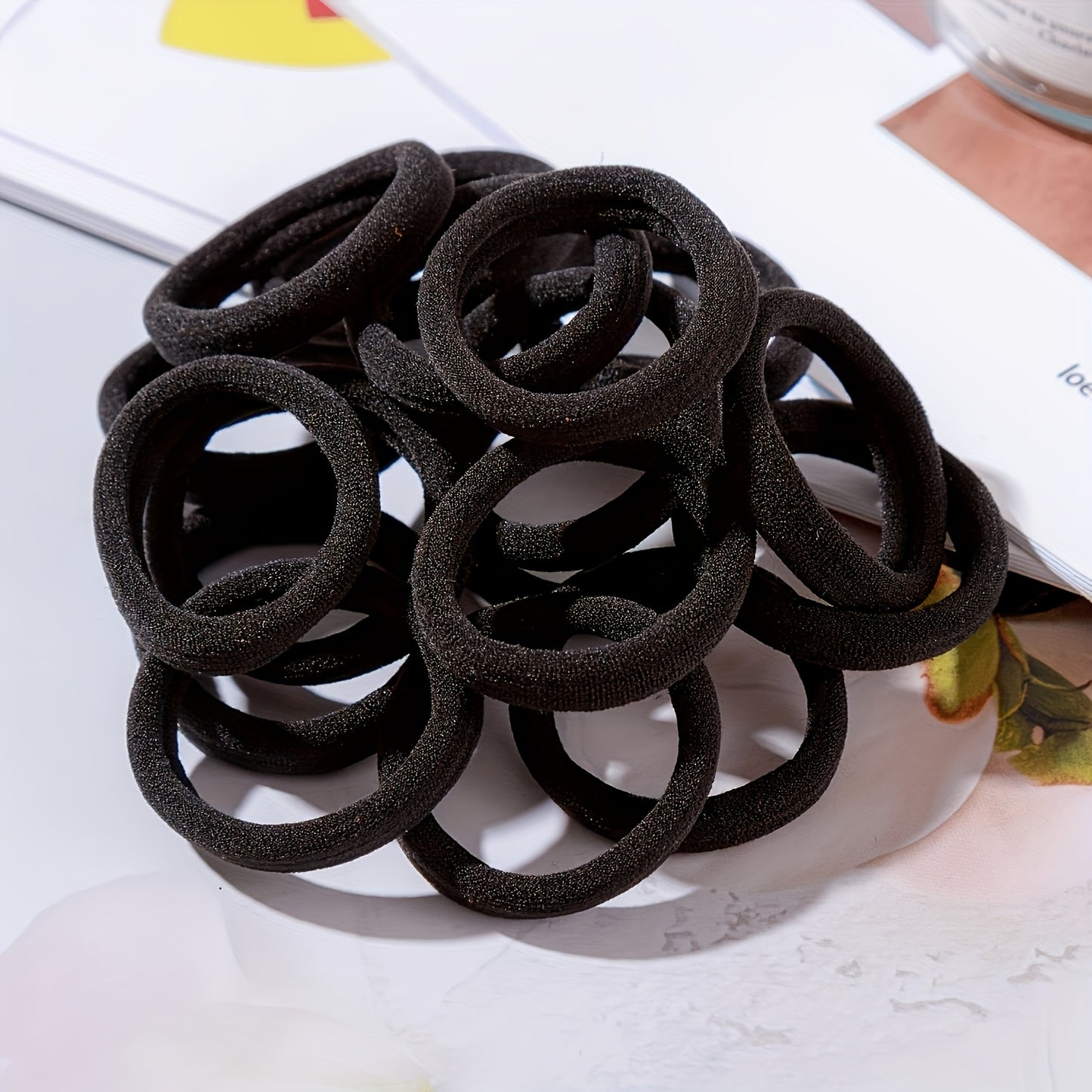 50-Pack High Elasticity Black Hair Ties - Simple Design for Everyday Styling and Versatile Use